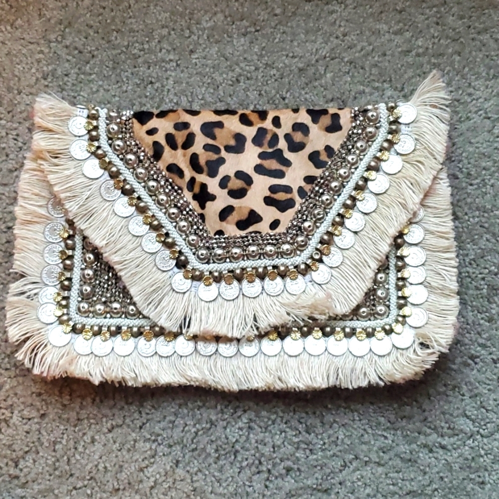 Shashi cheetah print clutch
